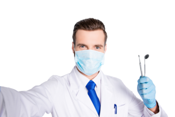 Self portrait of successful cheerful dentist in white lab coat, blue tie, shooting selfie on front camera, holding tools, having leisure, fun, video call, isolated on grey background