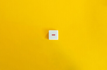 Red Minus Sign. Concept of Cons, Negative Aspects, Weaknesses, Risks and Disadvantages. Text on Block Letter Tiles on Yellow Background. Minimalist Aesthetics.