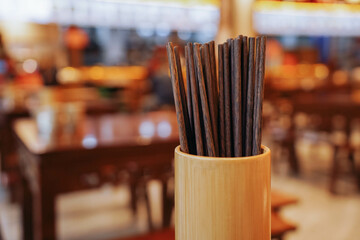 Old Fashioned Chopstick Holder, Chopsticks combined in storage.