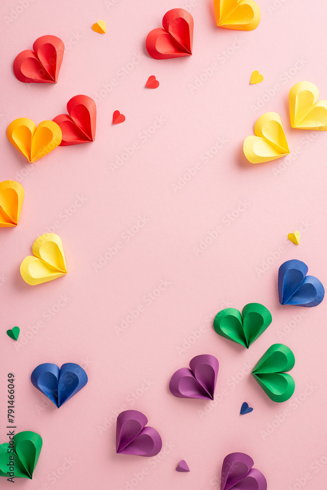 Wall mural brightly vertical colored paper crafted hearts arranged artistically on a pink background symbolizin