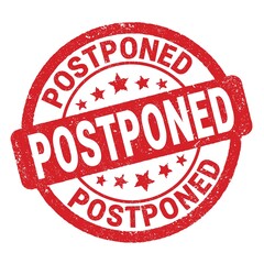 POSTPONED text written on red round stamp sign.