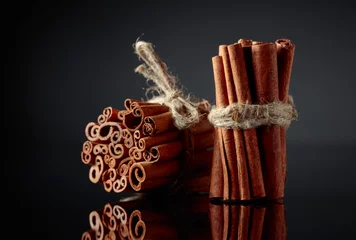 Rolgordijnen Cinnamon sticks, tied with jute rope. © Igor Normann