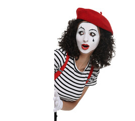 Funny mime with blank poster posing on white background