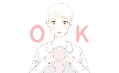 OKサインをしている白衣を着た女性医師