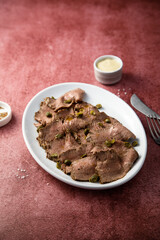 Homemade vitello tonnato with capers