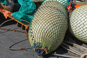 bladders used on a stern trawler vessel are located outside on the harbor quay
