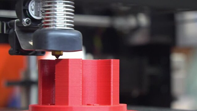 Close up scene the additive manufacturing by 3D printer machine.