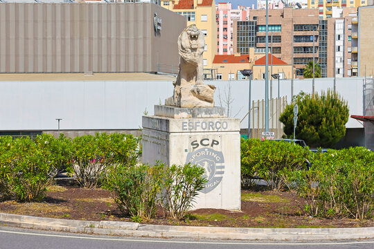 Lion statue at visconde alvalade roundabout in lisbon
