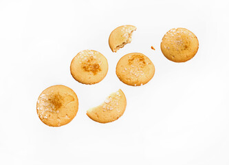 Flying white cookies with soda flavor on isolated background