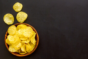 Oven backed low calorie potato chips. Snacks background, top view - 791492681