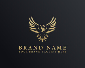 Eagle bird isolated company or brand identity logo design. Heraldic flying falcon bird vector illustration.