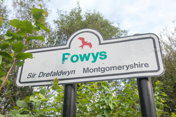 Sign on the Powys county border.