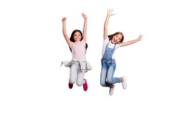 Full length body size view of two people attractive charming cheerful careless carefree straight-haired pre-teen girls having fun party overjoy great weekend day isolated on blue pastel background