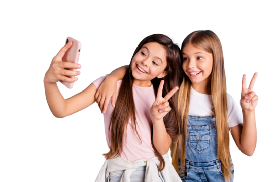 Close up photo two little she her blond brunette girls long pretty hair telephone make take selfies for mom mommy show v-sign wearing casual jeans denim t-shirts isolated blue bright background