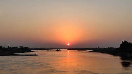 Fototapeta premium sunset over the lake