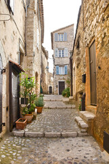 Narrow street of downtown in french village Saint-Paul-de-Vence, France