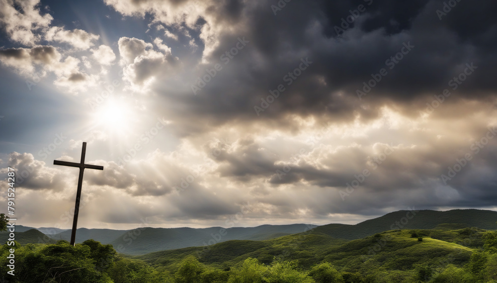 Wall mural atmospheric shining sky with a christian cross in the hills - Wall murals