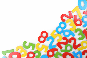 Colorful numbers on white background, top view