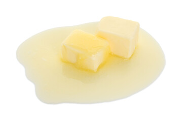 Pieces of melting butter isolated on white