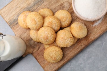 Tasty fresh sugar cookies on grey table, top view