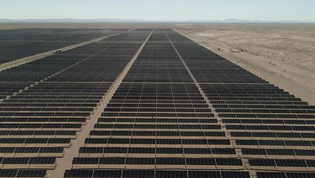 Aerial footage of the solar panels rows on a sunny day in Atacama Desert in Tarapaca, Chile