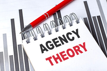 AGENCY THEORY ext on notebook on chart with pen
