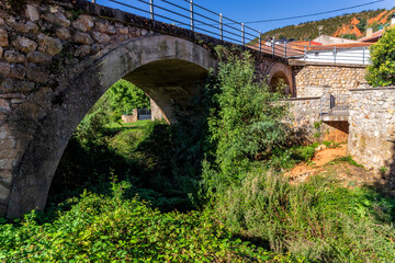 Bridge over Orchards stream in Retiendas. Guadalajara. Spain. Europe. - obrazy, fototapety, plakaty