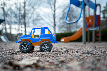 close up of suv style toy car at playground