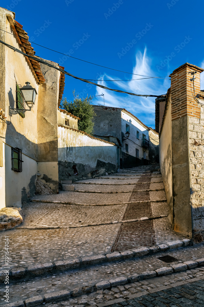 Wall mural treet with steps in chinchon. madrid. spain. europe.