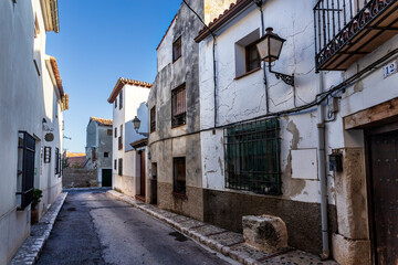 Rural and typical street in the village of Chinchon on a sunny day. Madrid. Spain. Europe.
