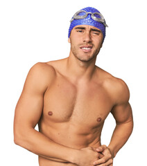 Young Hispanic man with swim gear having a liver pain, stomach ache.