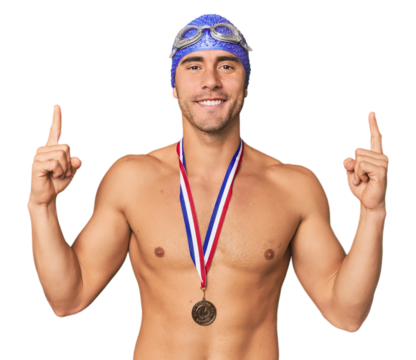 Hispanic male swimmer with gold medal celebrating victory
