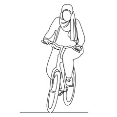 Muslim woman on a bicycle
