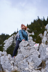 Woman mountaineer on a rocky mountain face