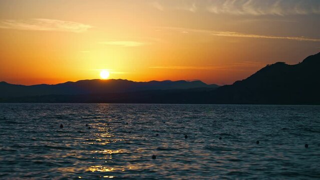 Beautiful sunset on Pefki beach on the island of Rhodes in Greece.