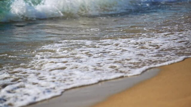 Tropic sea waves on the beach.