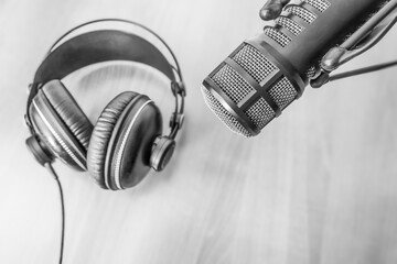 background with microphone and headphones on white background