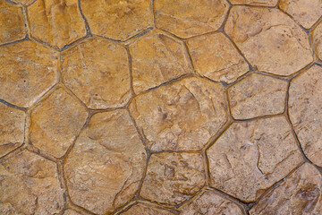 Stone surface made of artificial uneven tiles.