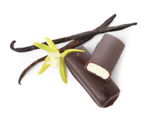 Glazed curd cheese bars, vanilla pods and flower isolated on white, top view