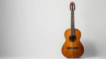A traditional acoustic guitar stands tall against a pure white canvas, embodying the timeless...