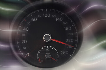 Fototapeta premium Speedometer on dashboard in car, motion blur effect