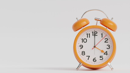 Yellow alarm clock on white background. The clock hand shows 4 o'clock