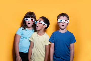 Kids with 3D Glasses on Vibrant Yellow Background