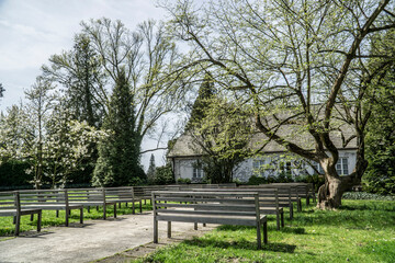 Manor house and benches in Zelazowa Wola, Poland - birthplace of Frederic Chopin