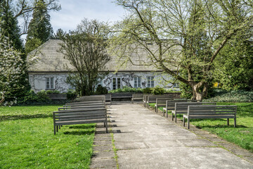 Obraz premium Manor house and benches in Zelazowa Wola, Poland - birthplace of Frederic Chopin