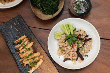 Asian dried beef fried rice with vegetables on table meal. Top View.