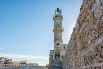 View of lighthouse in venetian harbor in Chania city on Crete island, Greece. - obrazy, fototapety, plakaty