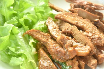 steamed slice sweet pork with green oak salad on plate dipping spicy chili sauce