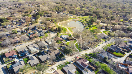 Lakeside residential neighborhood with bare trees wintertime suburbs Dallas Fort Worth metro complex, cul-de-sac dead-end street shapes keyhole, single family houses with swimming pools backyard - obrazy, fototapety, plakaty