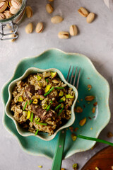 Turkish pilaf with chicken liver and pistachios